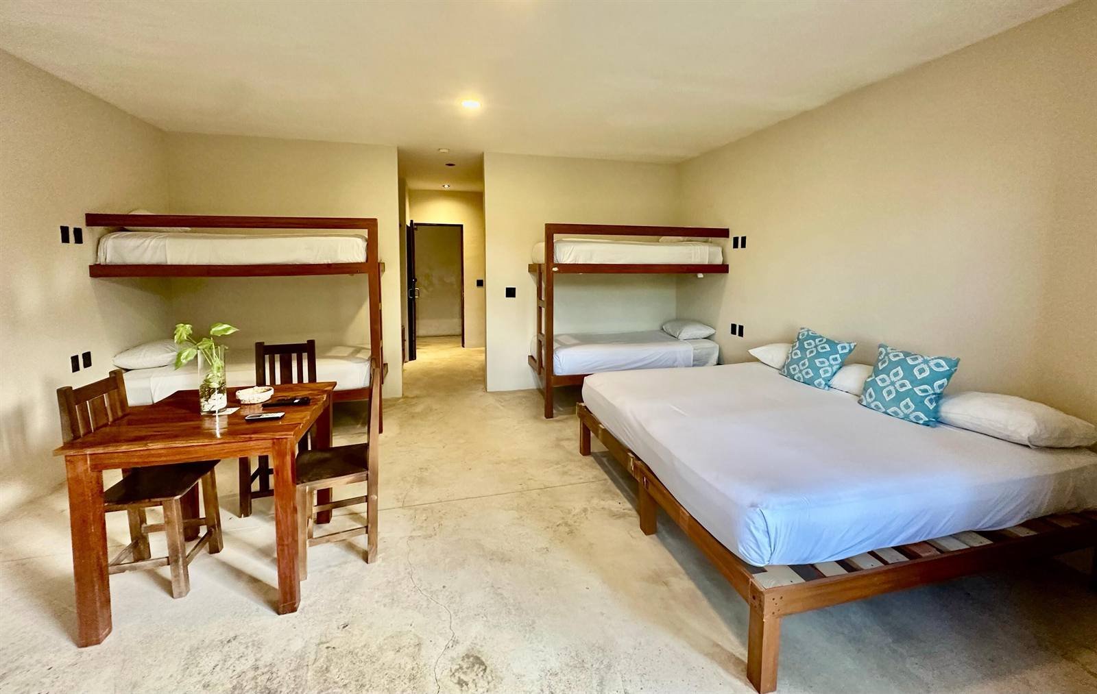 Moonshine Tulum Hotel: family studio suite with bunk beds and a dining table